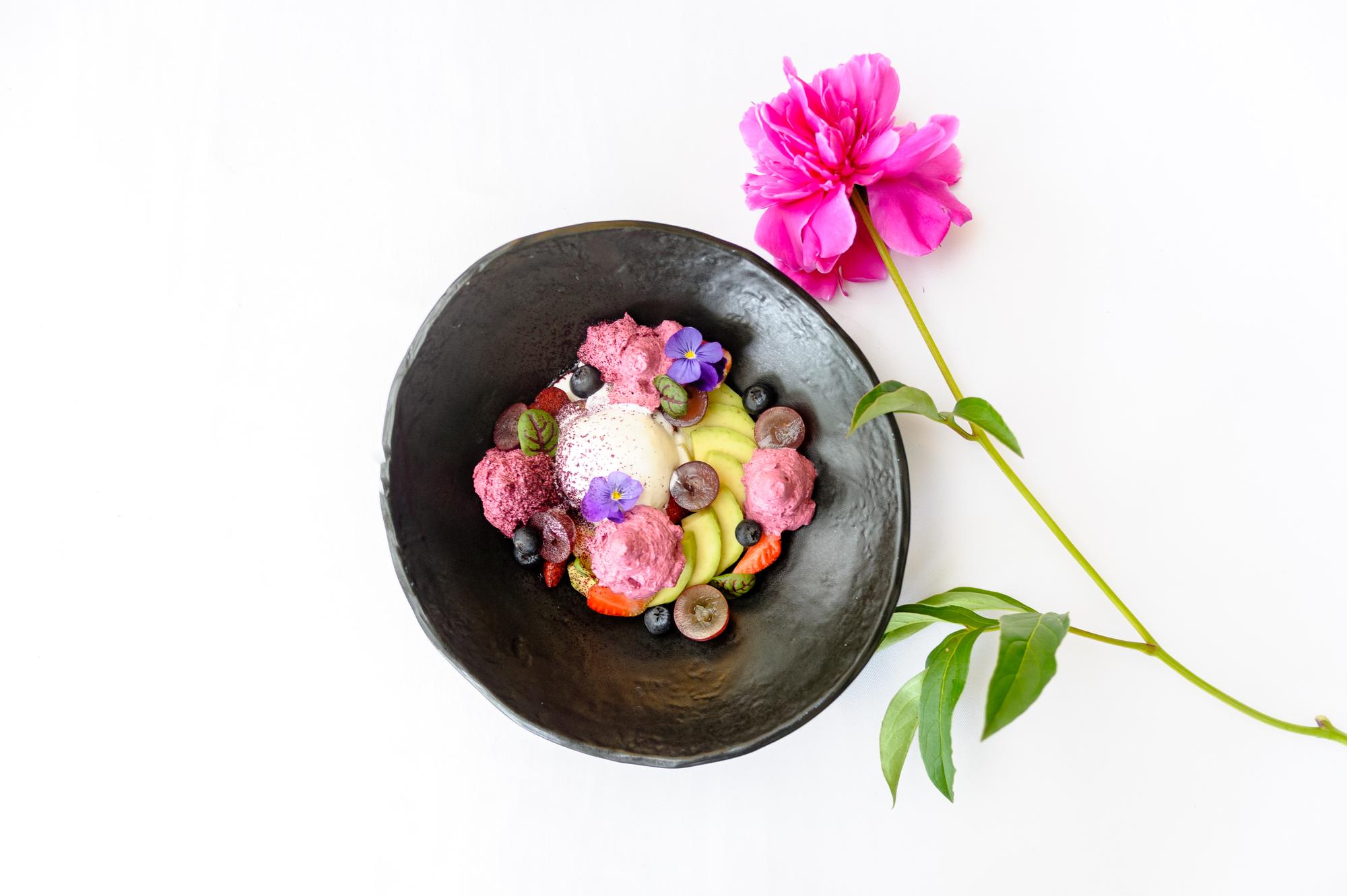 Styled plated meal on white board